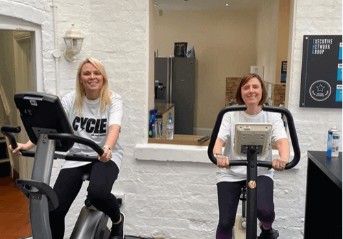 Women on exercise bikes