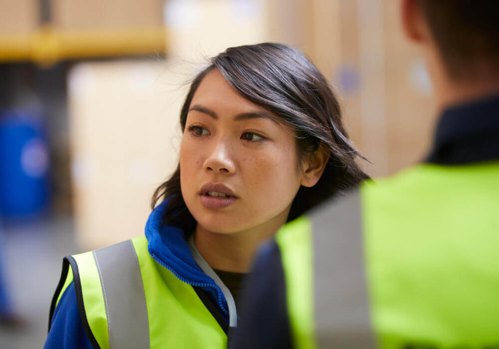 Woman wearing a hi viz jacket